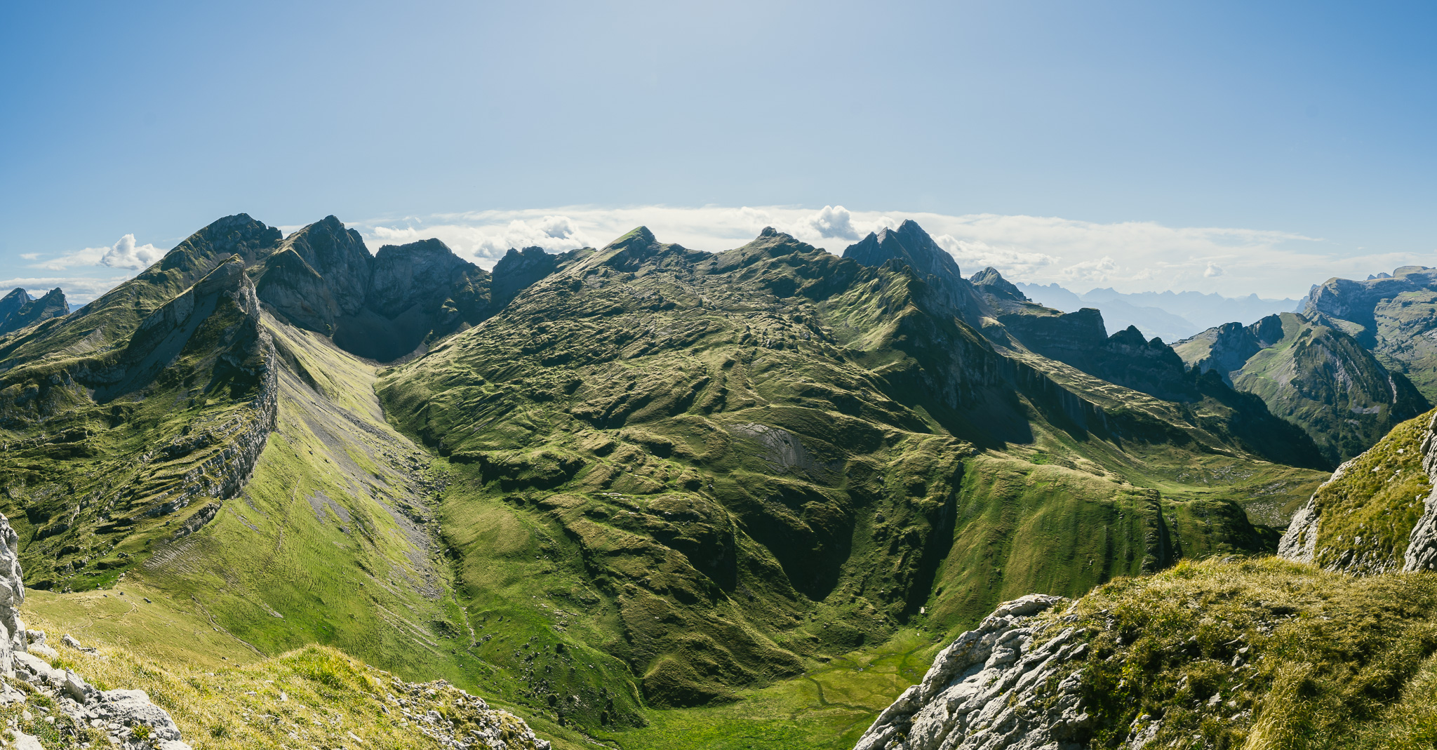 Panorama view from the summit of the Margelchopf after hiking in summer