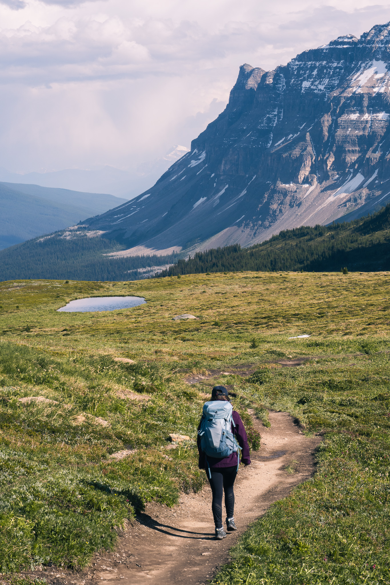 Alicia from the alive and roaming blog walking the trail to Helen lake in the Alberta province of Canada.