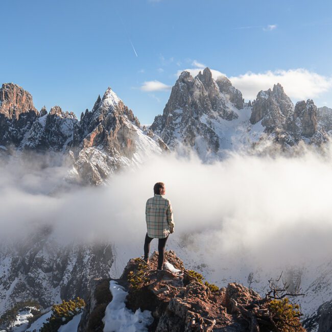 Alicia from Alive & Roaming at a viewpoint at Cadini di Misurina near Tre Cime di Lavaredo in the Dolomites