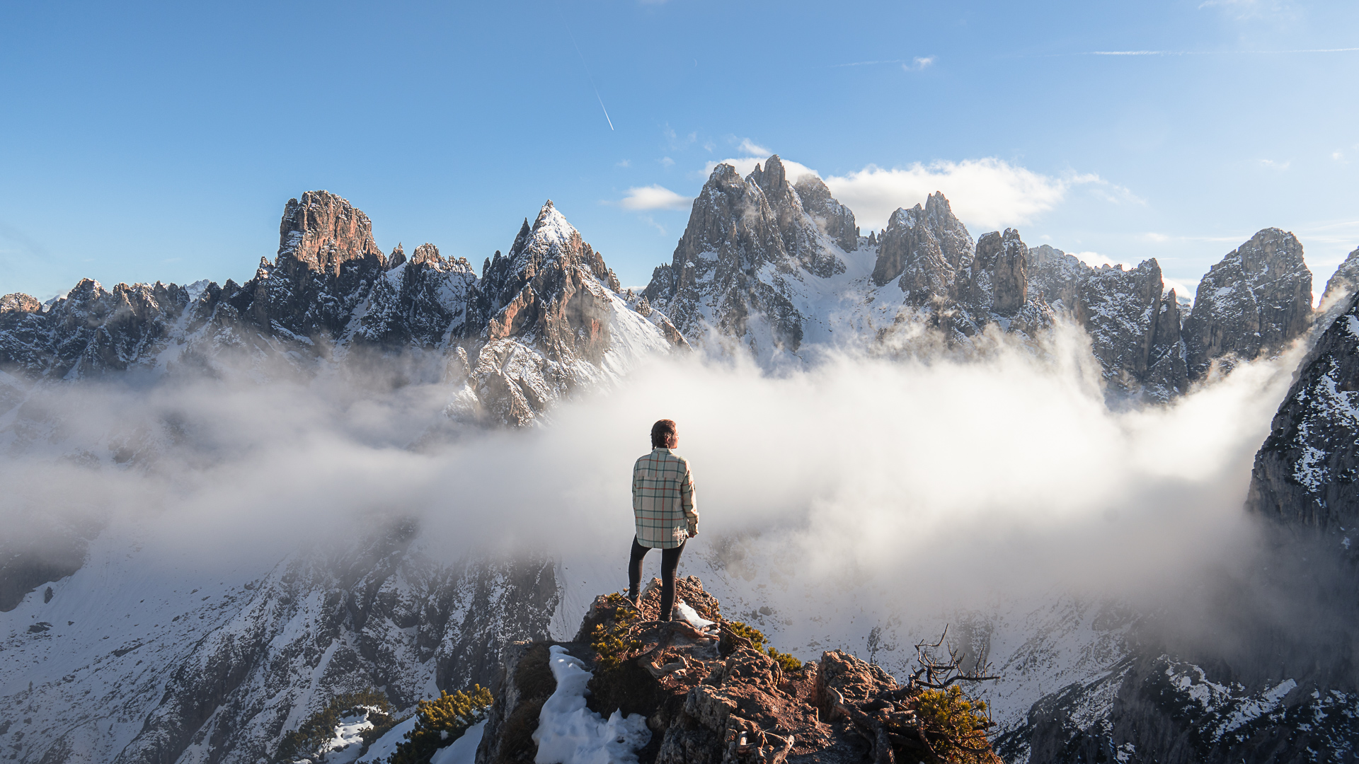 Alicia from Alive & Roaming at a viewpoint at Cadini di Misurina near Tre Cime di Lavaredo in the Dolomites